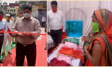 डीएम शेषमणि पांडेय ने किया रामघाट में स्वयं सहायता समूह मास्क स्टाल का शुभारम्भ