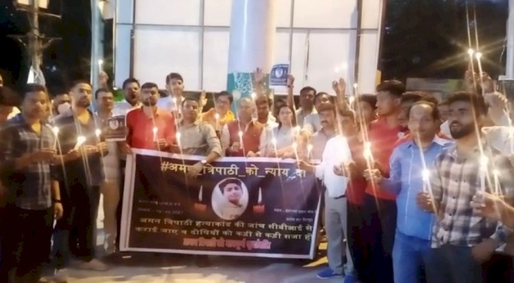 भाजपा नेता के नाबालिग पुत्र की हत्या के के विरोध में कैंडल मार्च निकाला