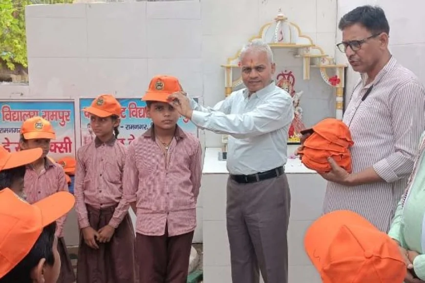बीएसए ने धूप से बचाव को बच्चों को बांटी कैप