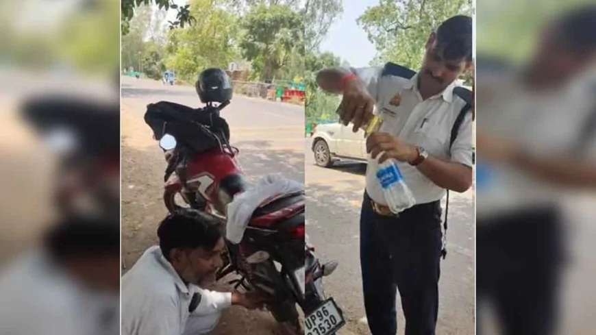 ट्रैफिक पुलिस ने लू की चपेट में आये बाइक सवार की मदद की